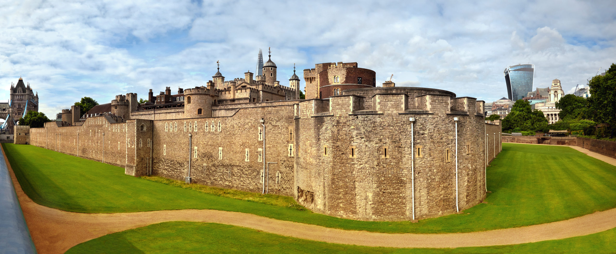 Panoramic image of Tower of London with dry moat and outer curtain wall in London, England, UK